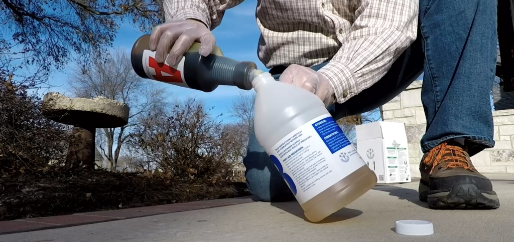 Mixing the two parts of postloc to create the expanding reaction that will set a fence post